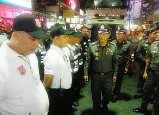 Acting Region 2 police chief Lt. Gen. Punya Mamen walks the entire length of Walking Street, shaking hands, posing for photographs and thanking officers for ensuring safety.